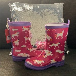 Girls Hatley rain boots and Burberry jacket